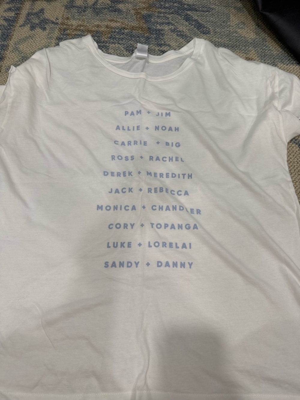White Graphic Tee with Blue Text